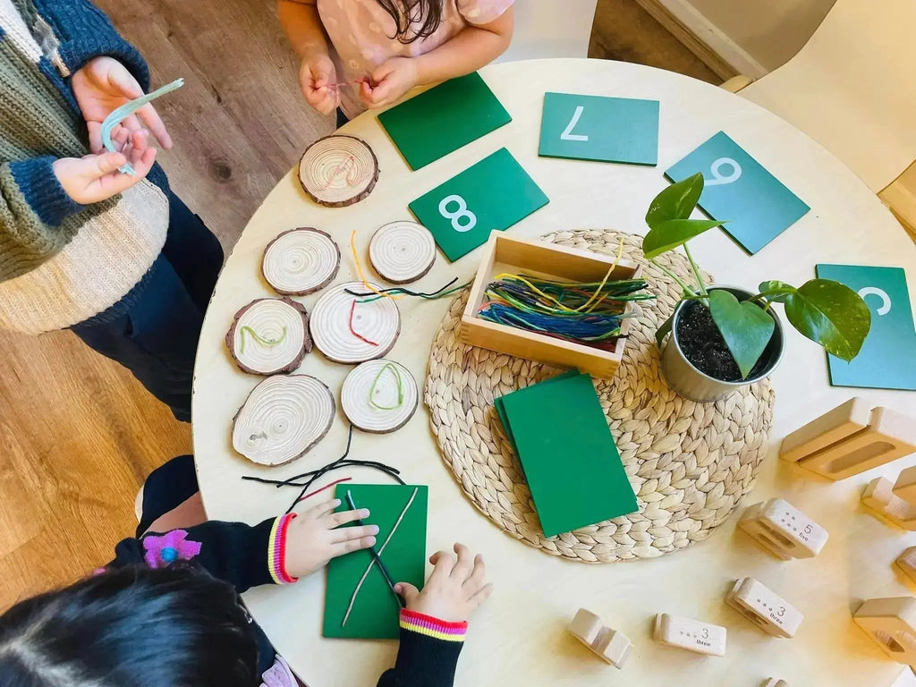 kids are playing with reusable wax sticks Crafty Curls for creative play