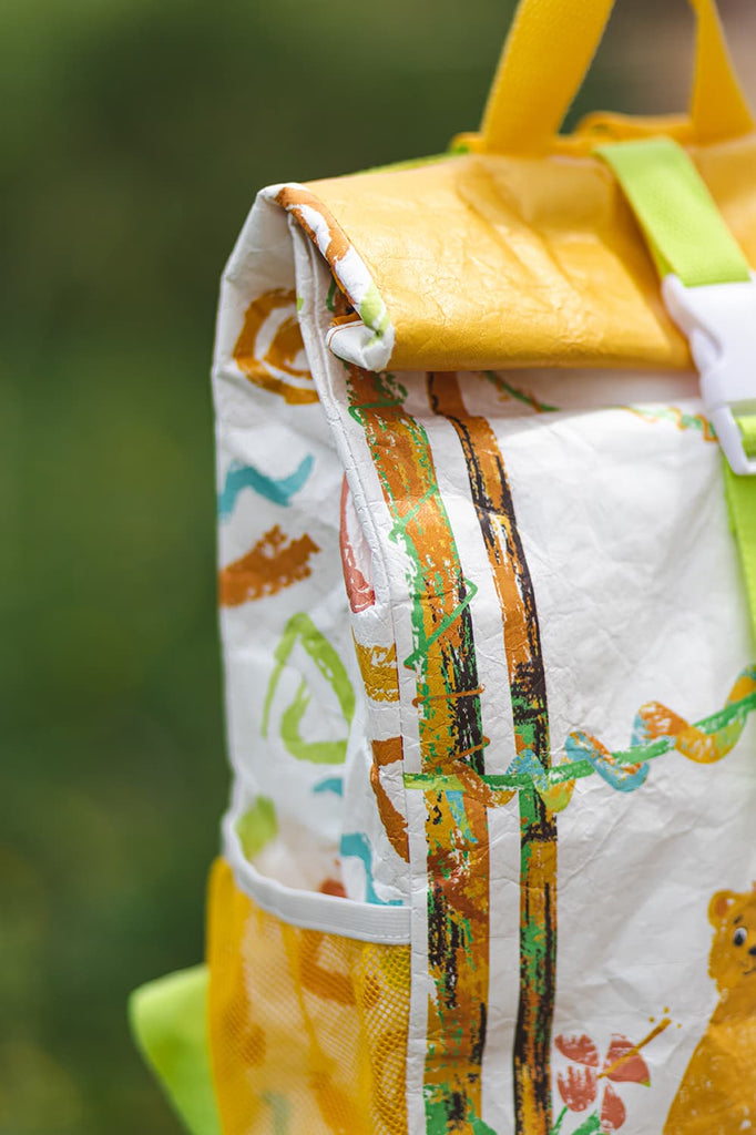 Two Cubs eco-friendly kids' backpack with a colorful animal print.