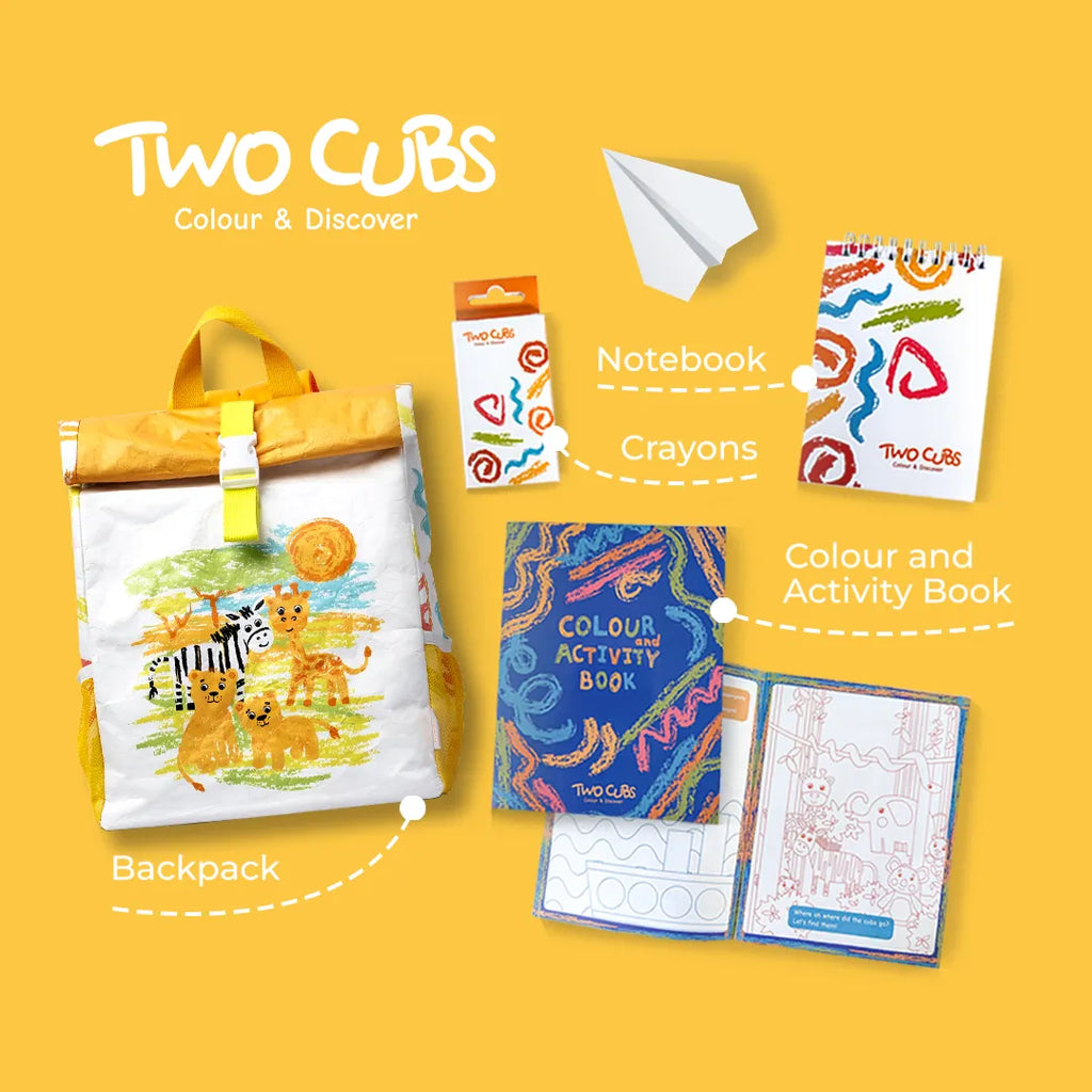 Two Cubs kids' activity set with a backpack, crayons, notebook, and colour activity book on a yellow background